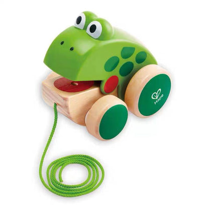 Frog dragging toddler hand-drawn toys